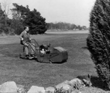 Shute mowing the extensive lawns at Pond Head